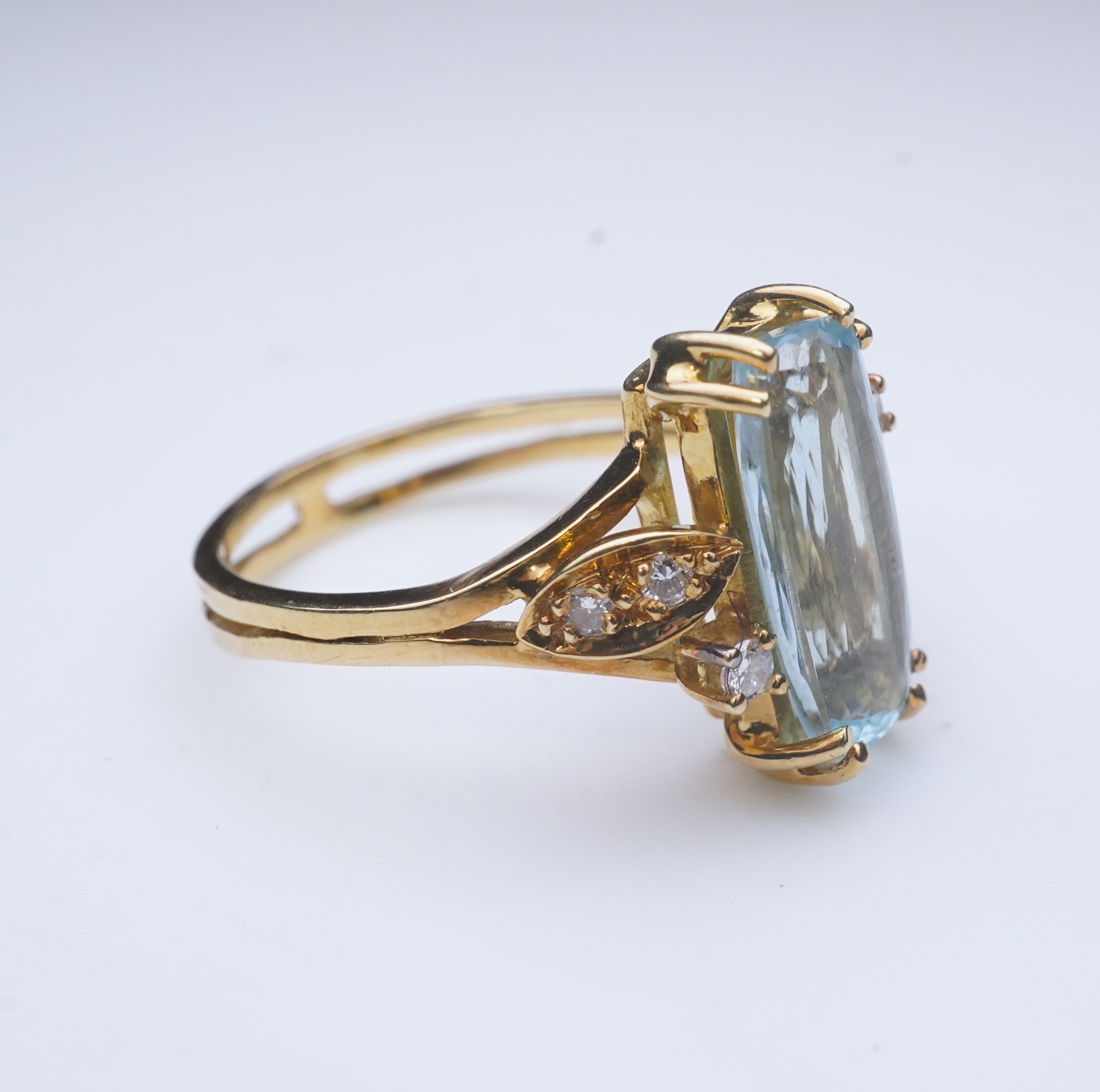 An aquamarine and diamond ring